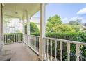 Cozy front porch featuring classic white railings, offering a welcoming outdoor space at 4096 Vinings Mill Se Trl, Smyrna, GA 30080