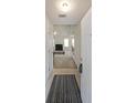 Inviting entryway with tiled floors leading into the open-concept living space at 2374 Brandenberry Ct, Decatur, GA 30034