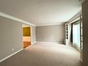 Spacious living room featuring neutral tones, built-in shelving, and large windows that offer abundant natural light at 2872 Bentwood Dr, Marietta, GA 30062