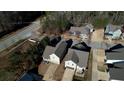An aerial shot of the home, showing the roof, the surrounding streets, and neighborhood layout at 5114 Arnold St, Covington, GA 30014