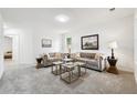 Stylish living room featuring neutral tones, plush seating, and an open layout at 6 Stonebridge Se Ct, Cartersville, GA 30121