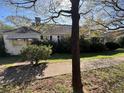 A classic single-story home featuring a traditional design at 5121 Newark Ave, Clarkdale, GA 30111