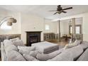 Bright living room showcasing an inviting fireplace and open dining area at 2876 White Oak Dr, Decatur, GA 30032