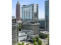 Modern high-rise building with glass facade and views of surrounding cityscape at 45 Ivan Allen Jr Nw Blvd # 2505, Atlanta, GA 30308