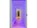 Modern hallway with unique LED lighting design and hardwood floors at 45 Ivan Allen Jr Nw Blvd # 2505, Atlanta, GA 30308