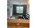 A cozy living area with natural light and an open floor plan, great for entertaining at 870 Mayson Turner Nw Rd # 1102, Atlanta, GA 30314