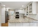 Modern kitchen featuring granite counters, stainless steel appliances, and ample cabinet space at 1215 Vista Leaf Dr, Decatur, GA 30033