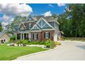 Beautiful two-story home with brick accents, well-maintained landscaping, and an attached two-car garage at 2637 Morningside Nw Trl, Kennesaw, GA 30144