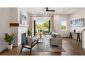 Inviting living room features a cozy fireplace, balcony access, and stylish decor at 2347 Hosea L Williams Ne Dr # 11, Atlanta, GA 30317