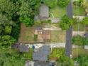 An aerial view of the property, showcasing its location within a neighborhood with mature trees at 2123 Drew Valley Ne Rd, Brookhaven, GA 30319