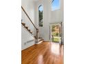 Open foyer with hardwood floors, staircase, and lots of natural light at 912 Chipley Ct, Marietta, GA 30062