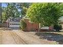 A single Gathering home with a detached garage and beautiful yard at 2611 Leeshire Ct, Tucker, GA 30084