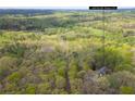 Aerial view of property showcasing wooded surroundings at 4286 Pool Rd, Winston, GA 30187