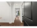 Inviting condo entryway with hardwood floors leading to an open living area at 2277 Peachtree Ne Rd # 302, Atlanta, GA 30309