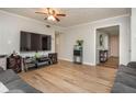 Spacious living room with wood flooring and plenty of room for entertainment and gatherings at 365 Winding River Dr # E, Atlanta, GA 30350