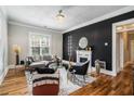 Quaint single story brick home featuring charming front porch and manicured lawn at 50 Ormond Sw St, Atlanta, GA 30315
