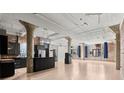 Open concept kitchen with sleek black cabinetry and stainless steel appliances in a spacious loft at 434 Marietta Nw St # 301, Atlanta, GA 30313