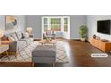 Bright living room features hardwood floors, a plush sofa and bay windows at 2397 Charleston Ter, Decatur, GA 30034