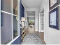 Inviting entryway featuring hardwood floors and an open view of the dining area at 515 Regency Trl, Acworth, GA 30102