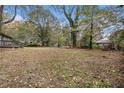 Large, expansive backyard with plenty of space for outdoor activities and landscaping at 2760 Swansea Ct, College Park, GA 30349