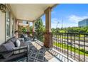 A furnished balcony with a view of trees and traffic at 1735 Peachtree Ne St # 316, Atlanta, GA 30309