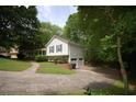 Home featuring a well maintained yard and long driveway, with an attached garage at 188 Thornbrooke Dr, Hiram, GA 30141