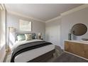 Inviting bedroom featuring soft lighting, modern decor, comfortable bed, and stylish accents at 57 Forsyth Nw St # 6A, Atlanta, GA 30303
