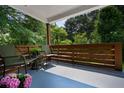 Cozy front porch with comfortable seating, perfect for relaxing and enjoying the outdoors at 1558 Line St, Decatur, GA 30032