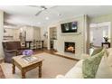 Inviting living room with fireplace, hardwood floors, and neutral tones, perfect for relaxation at 3042 Argonne Dr, Atlanta, GA 30305