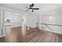 Inviting living space with hardwood floors, stylish columns, and great flow to other rooms at 3729 Inglewood Ne Way, Atlanta, GA 30319