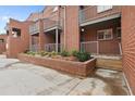 Attractive brick townhouse showcases landscaped grounds and private balconies in a desirable community at 387 Ralph Mcgill Ne Blvd # K, Atlanta, GA 30312