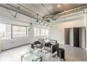 Bright living room with large windows offering city views and sleek contemporary design at 120 Ralph Mcgill Ne Blvd # 1502, Atlanta, GA 30308