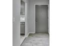 Inviting hallway featuring modern gray tones and durable wood-look flooring at 3650 Ashford Dunwoody Rd, Ne, #923 # 923, Atlanta, GA 30319