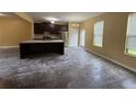 Open concept kitchen with large island, stainless steel appliances, and a pantry at 102 Daisy Cir, Mcdonough, GA 30252