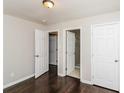 Cozy bedroom featuring multiple closets and access to a well-lit bathroom at 2500 Swallow Circle Southeast Se Cir, Atlanta, GA 30315