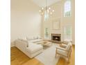 Inviting living room with vaulted ceiling, fireplace, and lots of natural light at 2738 Riderwood Ne Ln, Marietta, GA 30062