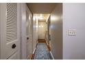Inviting entryway with hardwood floors and a view of the front door at 1406 Springleaf Se Cir, Smyrna, GA 30080