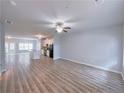 Spacious open-concept living room with modern flooring and neutral paint at 1892 Old Dogwood, Jonesboro, GA 30238