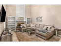 Bright living room showcasing fireplace, built-in shelving, and large sectional sofa at 1355 Pinebreeze Way, Marietta, GA 30062