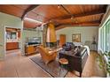 Inviting living room with a vaulted ceiling, fireplace, and lots of natural light at 3408 Chestnut Dr, Doraville, GA 30340
