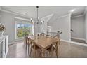 Elegant dining room with natural light and stylish furnishings for comfortable dining at 1094 Township Sq, Alpharetta, GA 30022