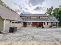 Well-maintained home features an attached two-car garage and inviting front entrance at 8710 Mount Rushmore Dr, Johns Creek, GA 30022