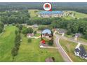Aerial view of neighborhood showing proximity to green space, other homes and nearby Rocksprings Elementary at 502 Gallantry Trl, Mcdonough, GA 30252