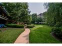 Well-maintained grounds feature lush lawns, mature trees, and inviting walkways for a peaceful living environment at 1800 Clairmont Lk # 413, Decatur, GA 30033