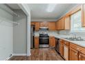 Functional kitchen with stainless steel appliances and light wood cabinets at 3037 Botany Dr, Jonesboro, GA 30236