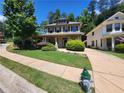 Traditional-style home with well-maintained lawn and a fire hydrant in the foreground at 2439 Muirfield Pl, Atlanta, GA 30337