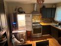 Well-equipped kitchen featuring stainless steel appliances and wood countertops at 3317 Shady Oak Dr, Atlanta, GA 30340