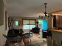 Inviting living room with a unique turquoise door and abundant natural light at 3317 Shady Oak Dr, Atlanta, GA 30340