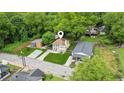 Aerial view of the home with mature trees and a well-maintained lawn at 1001 Dunning Se St, Atlanta, GA 30315