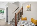 Entryway with staircase, bench seating and modern flooring at 5341 Tall Oak Dr, Marietta, GA 30068